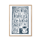 En kop kaffe på en bænk med dig - blå